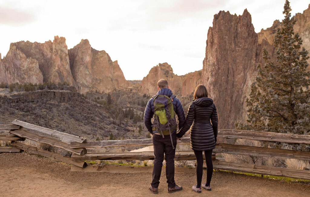 Couple holding hands at Smith Rock State Park