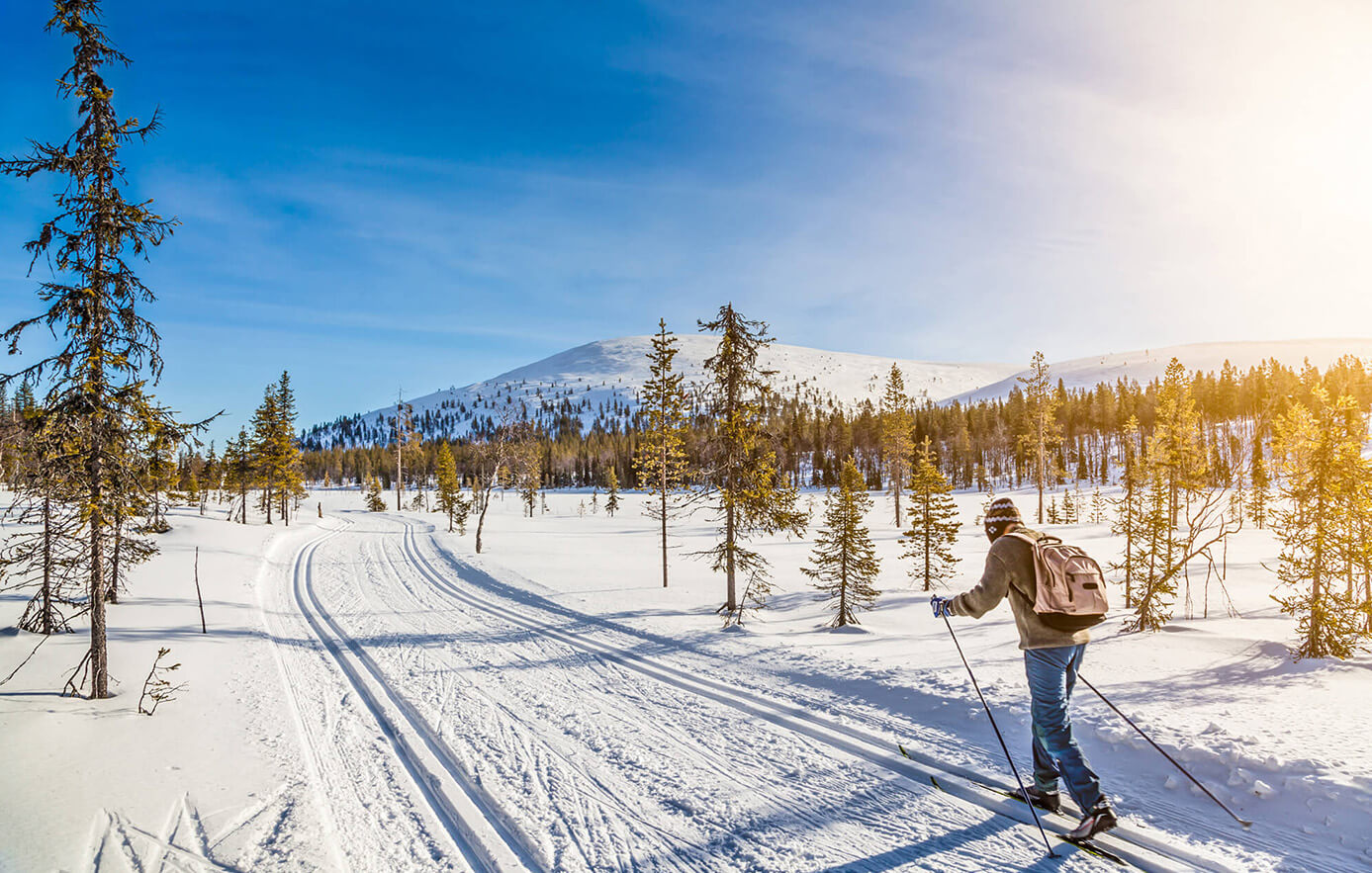 Person cross country skiing